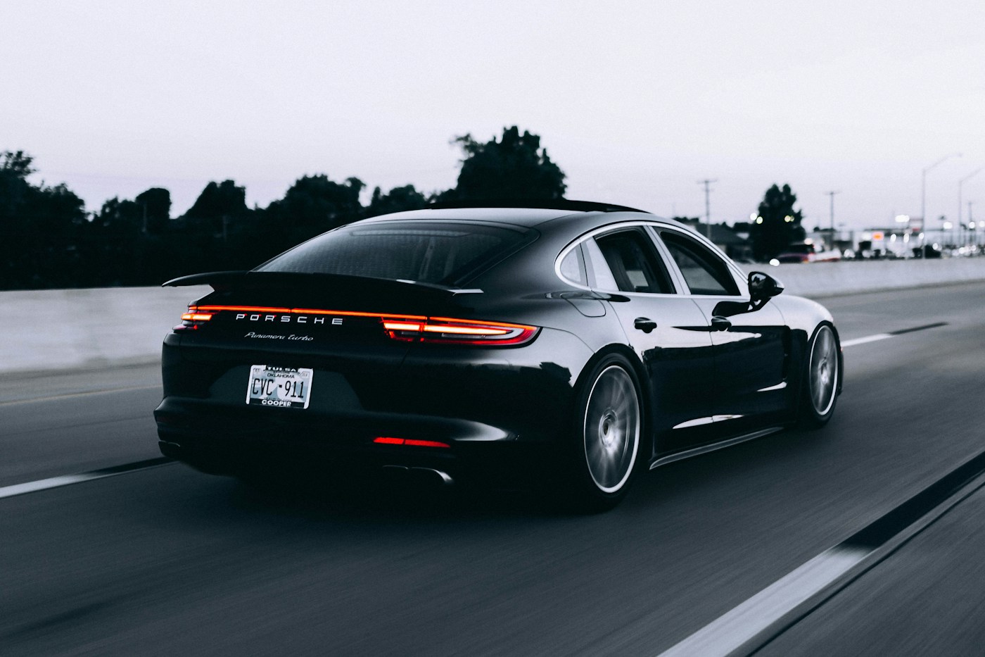 Sports sedan on a road, illustrative vehicle photography